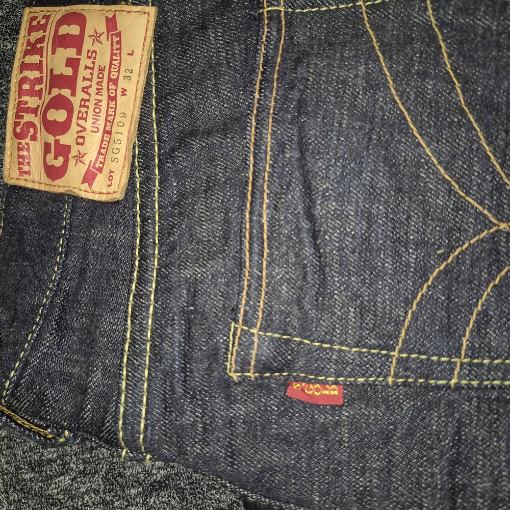 The Strike Gold Slim Tapered Jeans